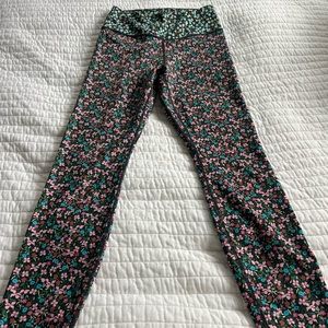 Nike woman’s sportswear floral leggings (size S)